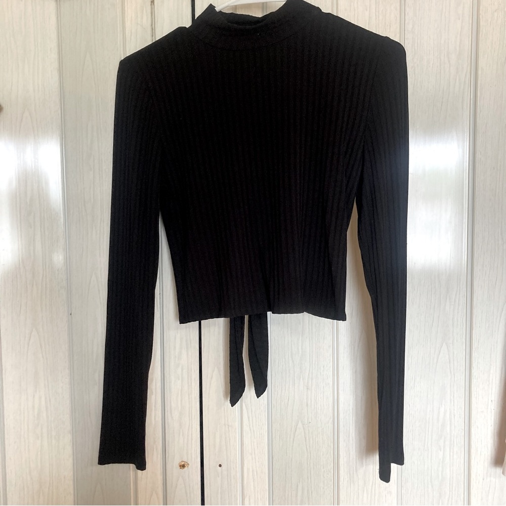 black long sleeve top with open back